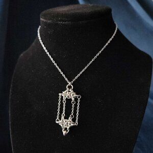 Gothic cage necklace with a small silver chain